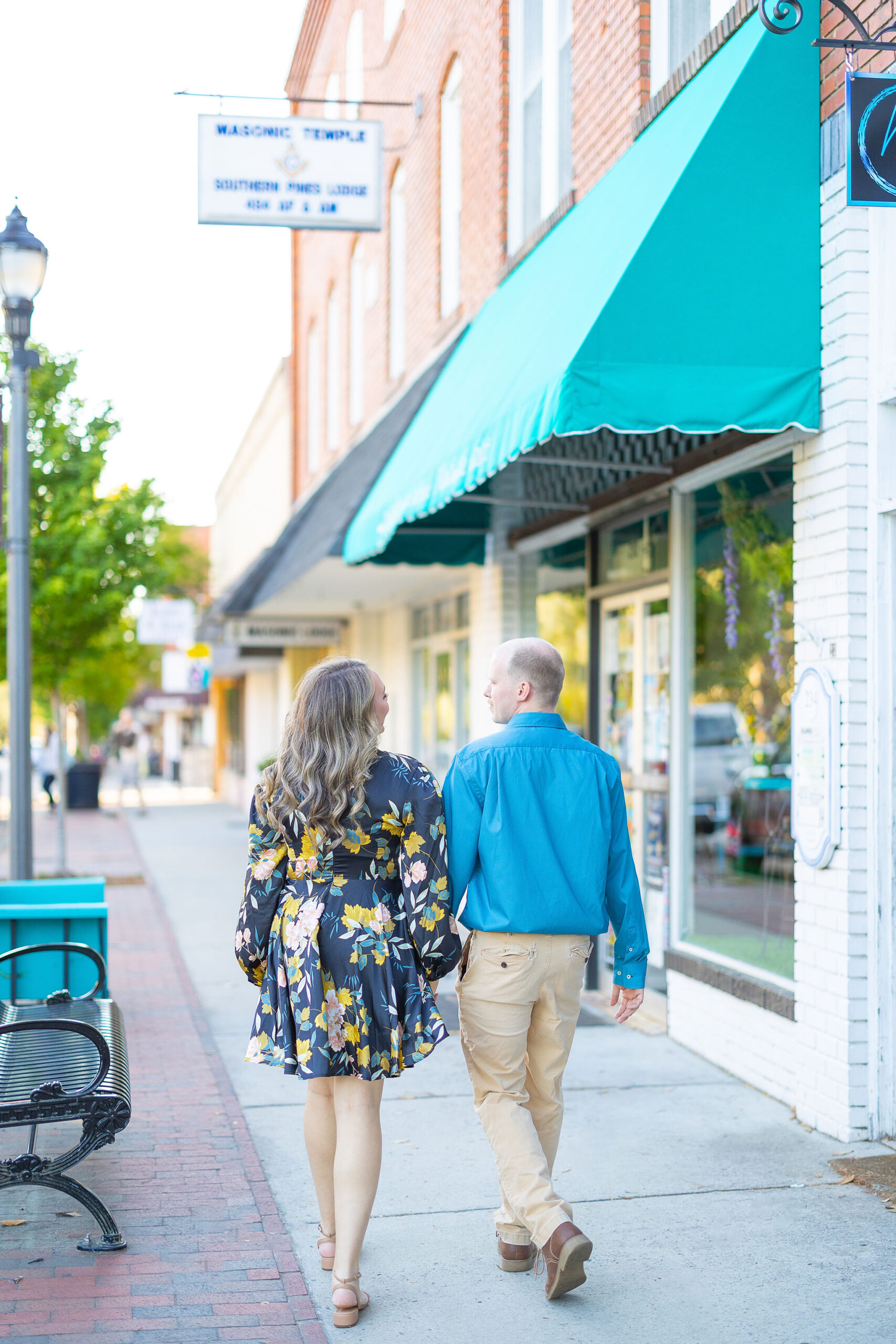 Couple Walking Through Town