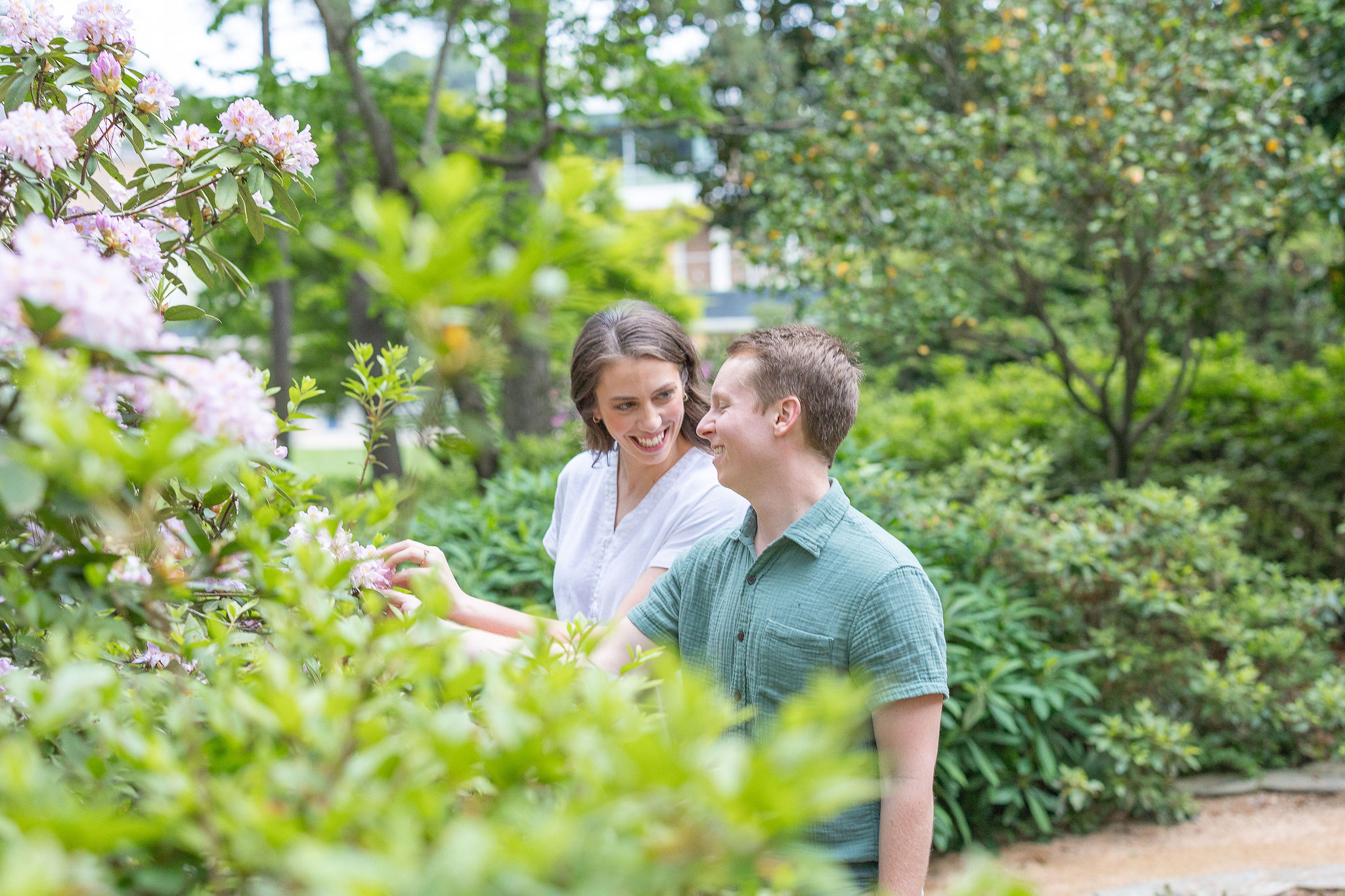 Girl looking at guy in garden