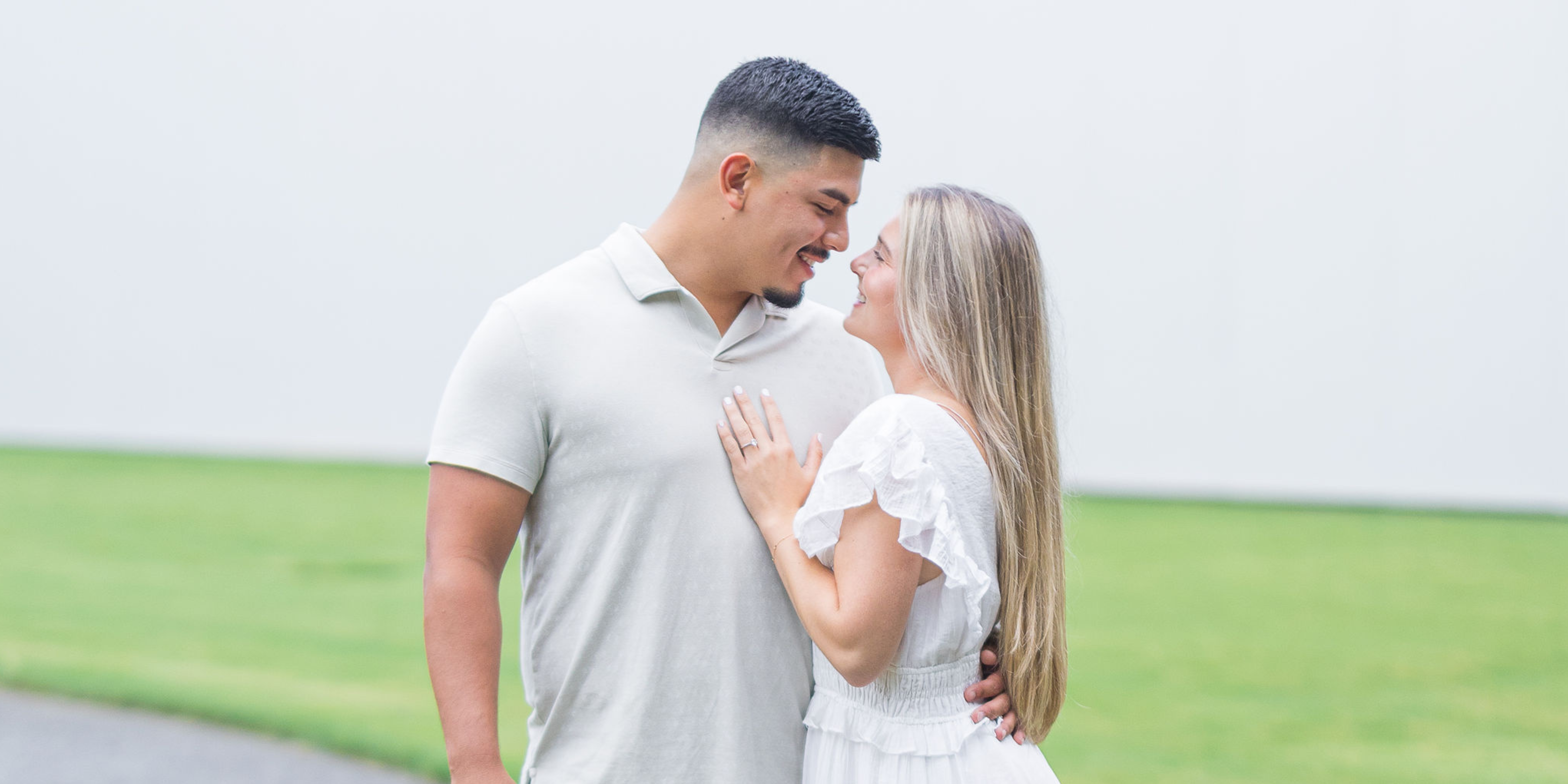 Couple looking at each other outside