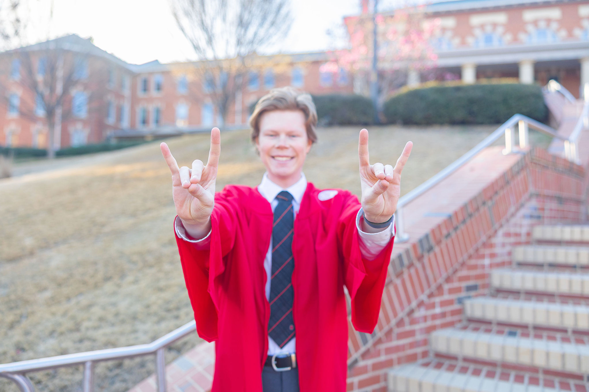 NC State grad posing in the court of carolina