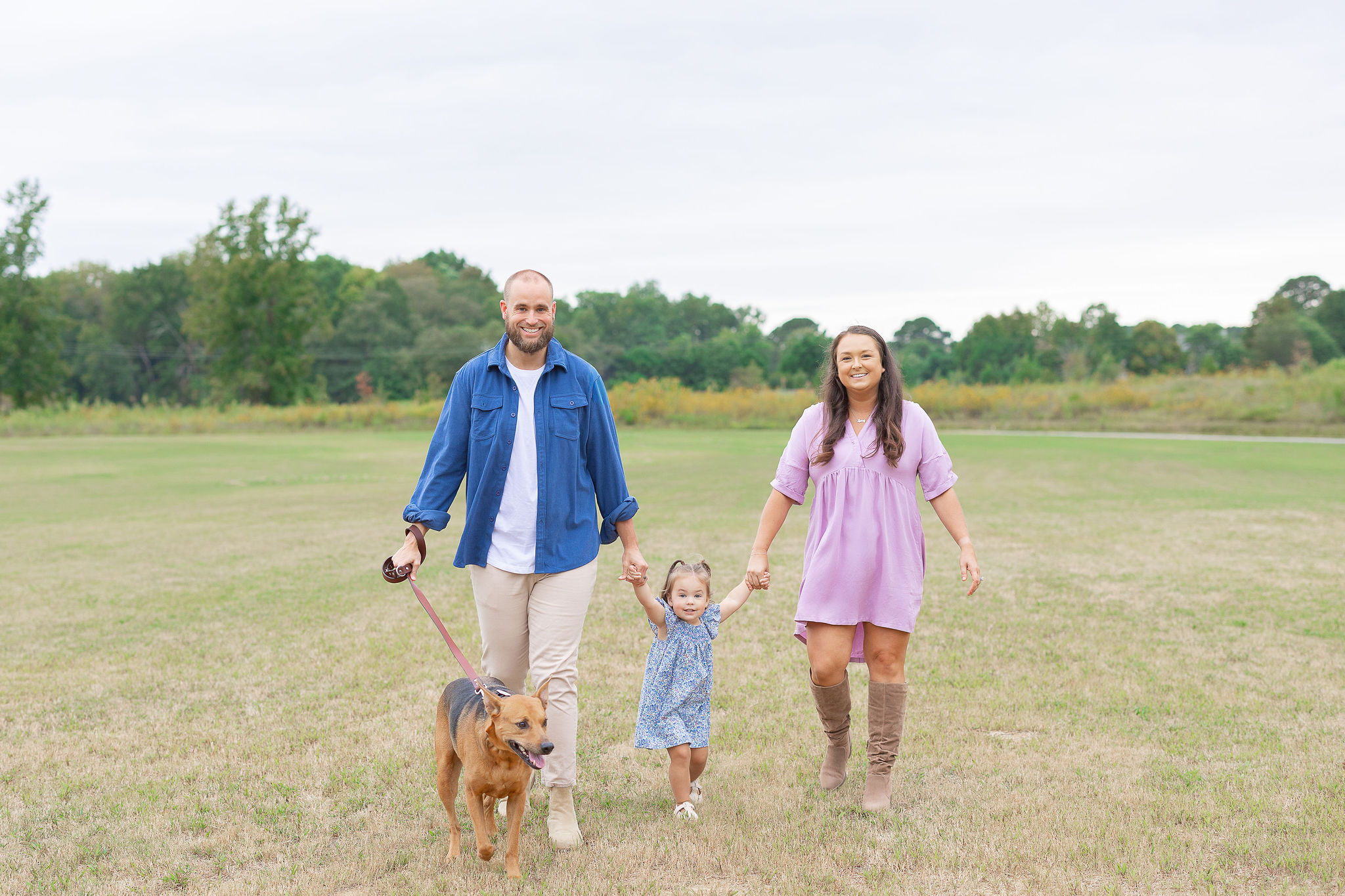 Family walking in field