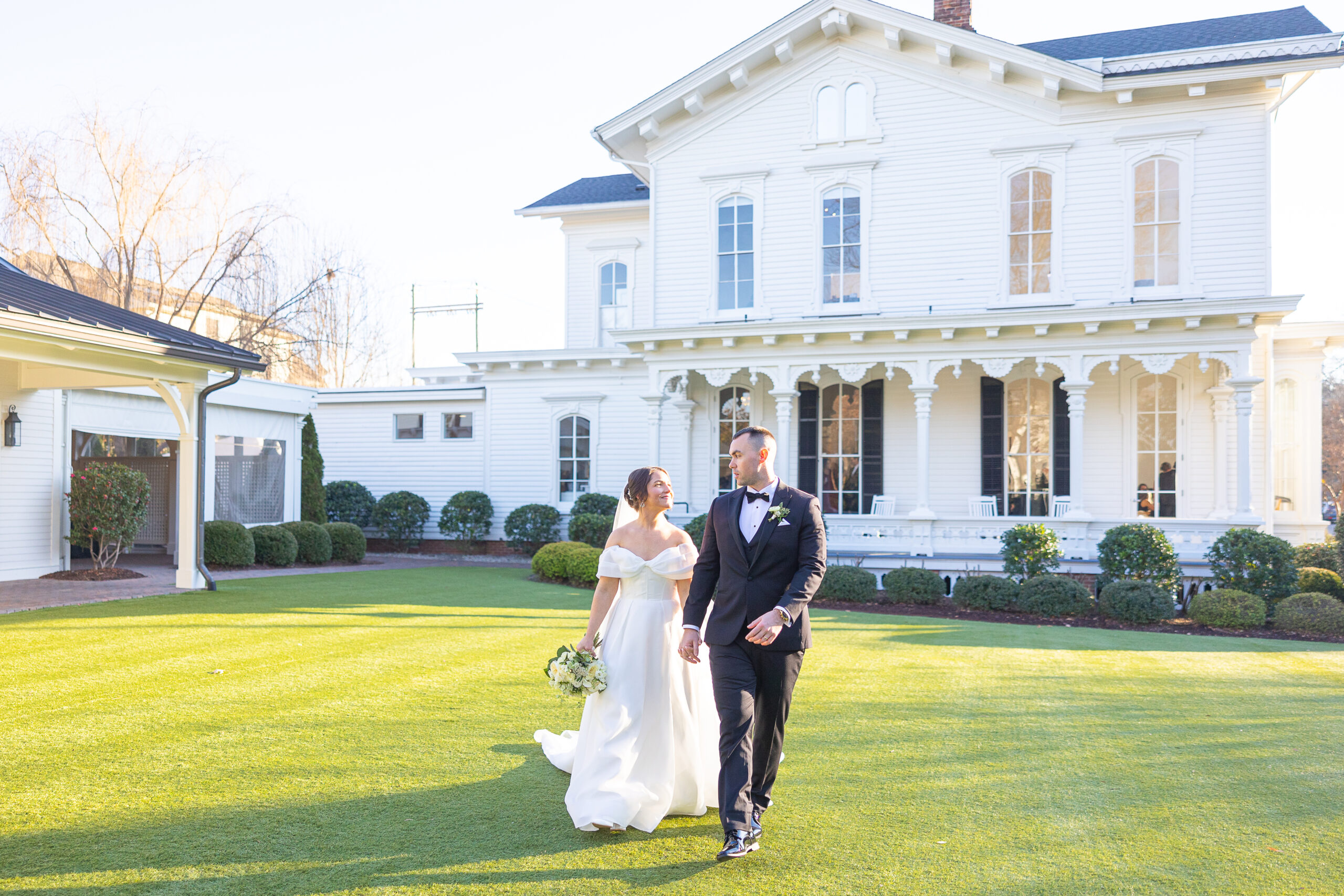 Bride and Groom on Lawn of Raleigh Wedding venue