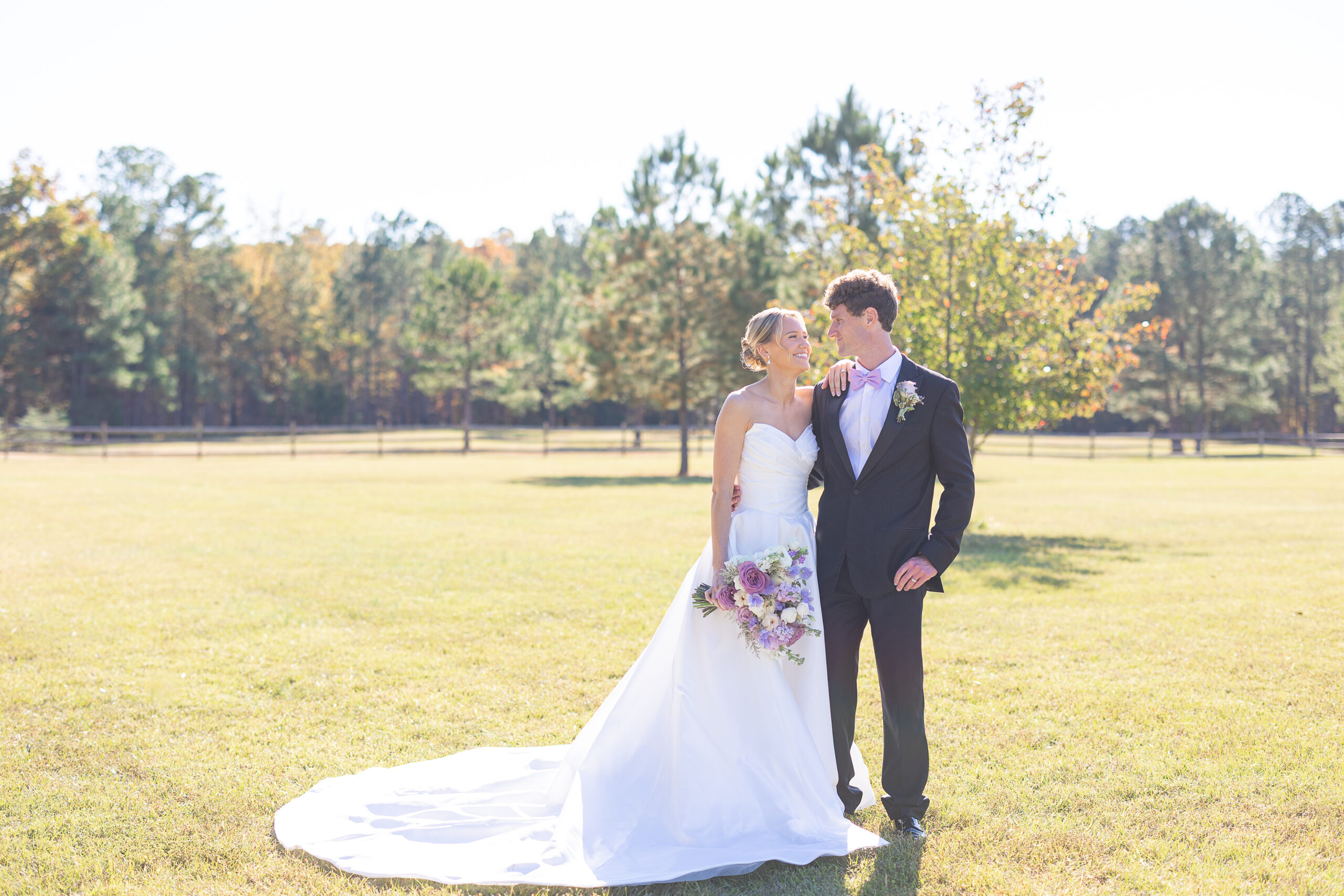 bride and groom on lawn