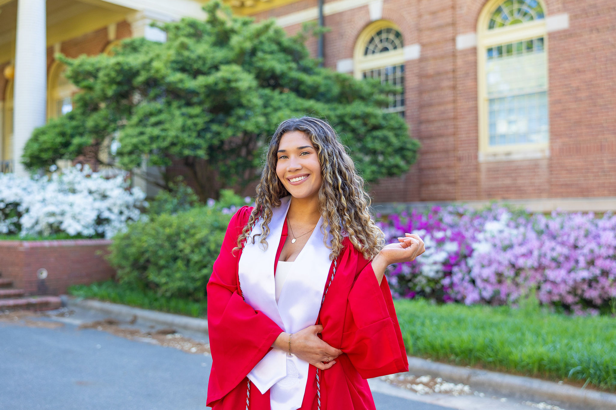 NC State Senior in Red Gown Outside