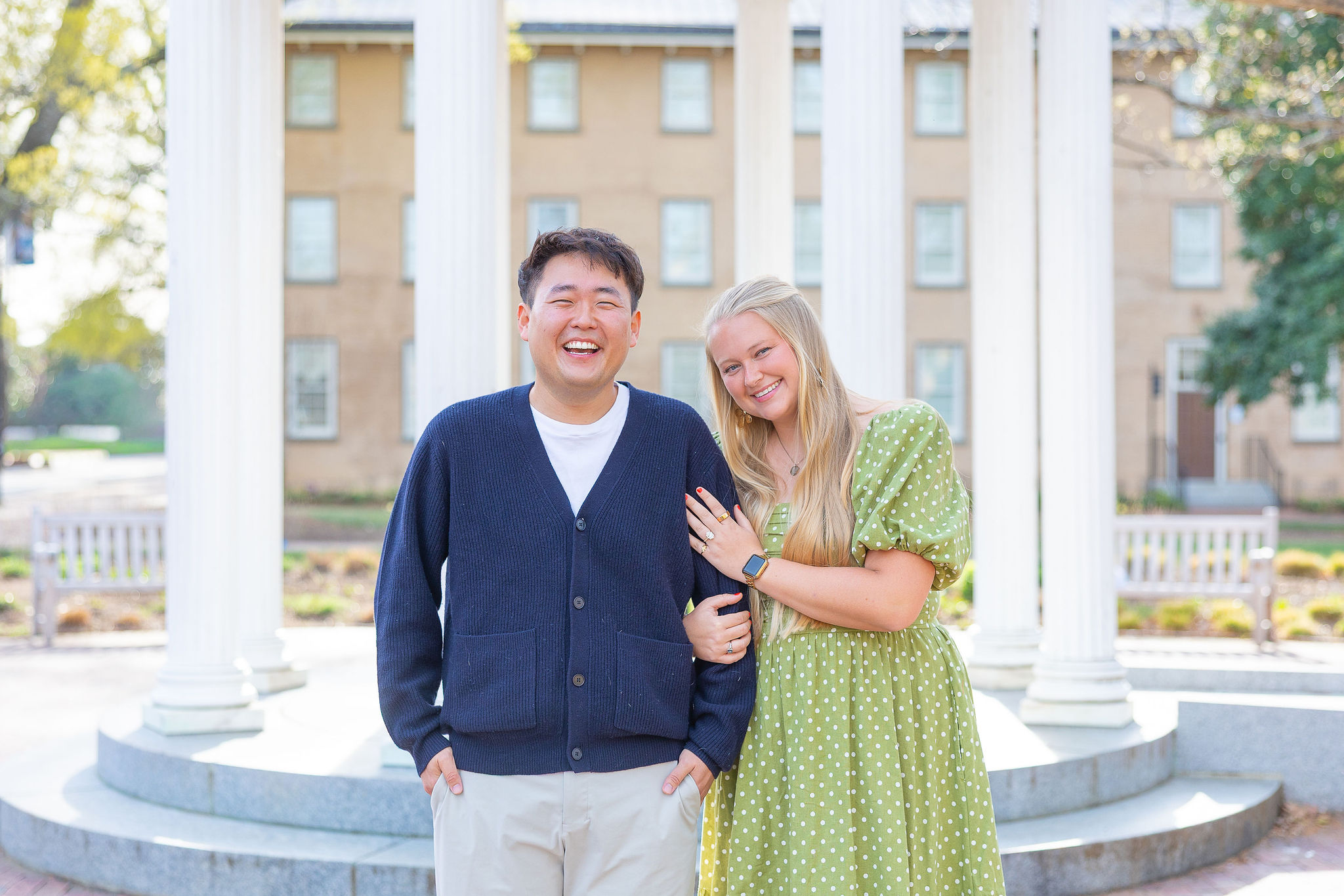 couple at old well on UNC campus