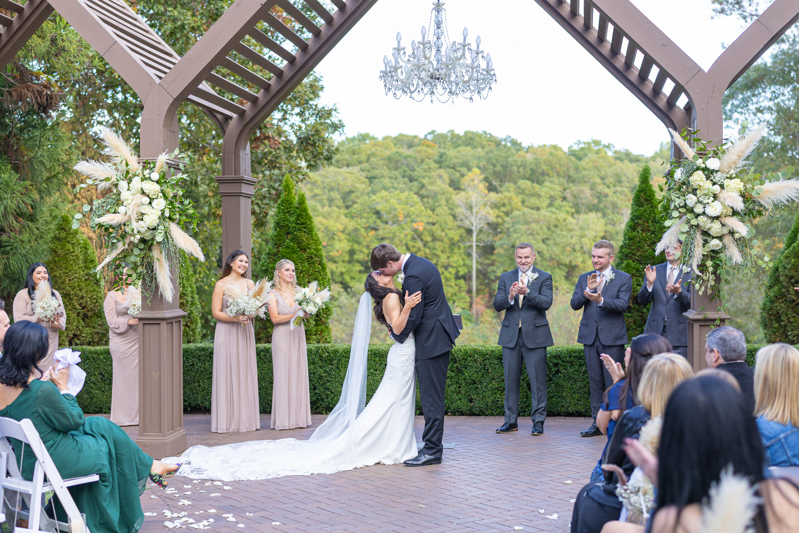 Bride & Groom kissing at alter