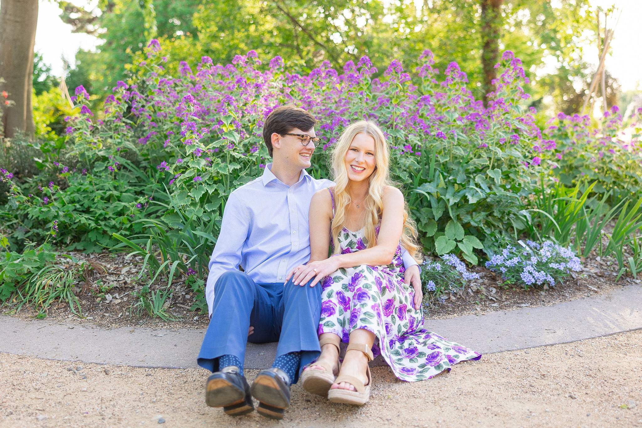 couple sitting down in a garden